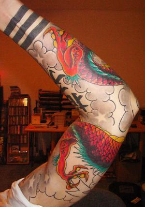 Tribal arm tattoos. Chinese Sleeve Dragon Tattoo