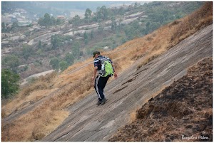 Descending the steep rock