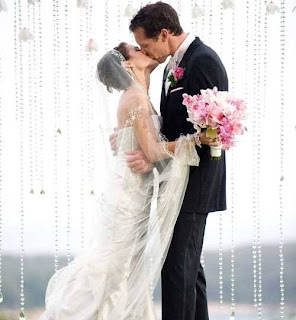 A stunning crystal wedding ceremony backdrop.