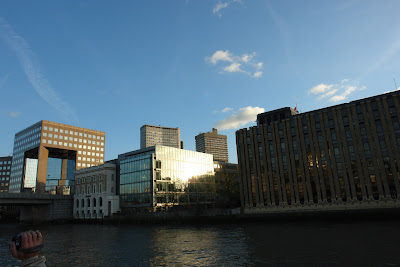 Flashes of sunlight on building along the Thames