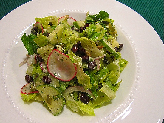 Chopped Romaine Salad with Radish, Black Bean, Cucumber, Red Onion, Avocado, Pumpkin Seeds, Mint, Queso Fresco & Roasted Pepper Ranch Dres