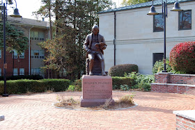 Ben Franklin statue outside the Library on a sunny day