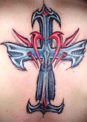 cross tattoo color. Tribal Cross Tattoo Design. The tattoo could have a circle on it