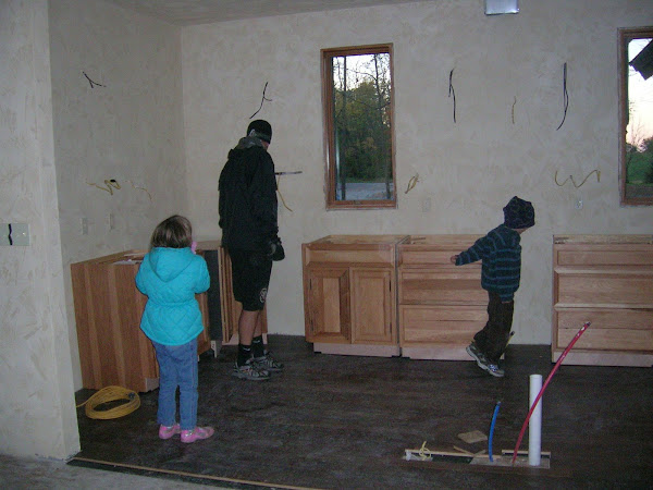 Kids checking out new cabinets