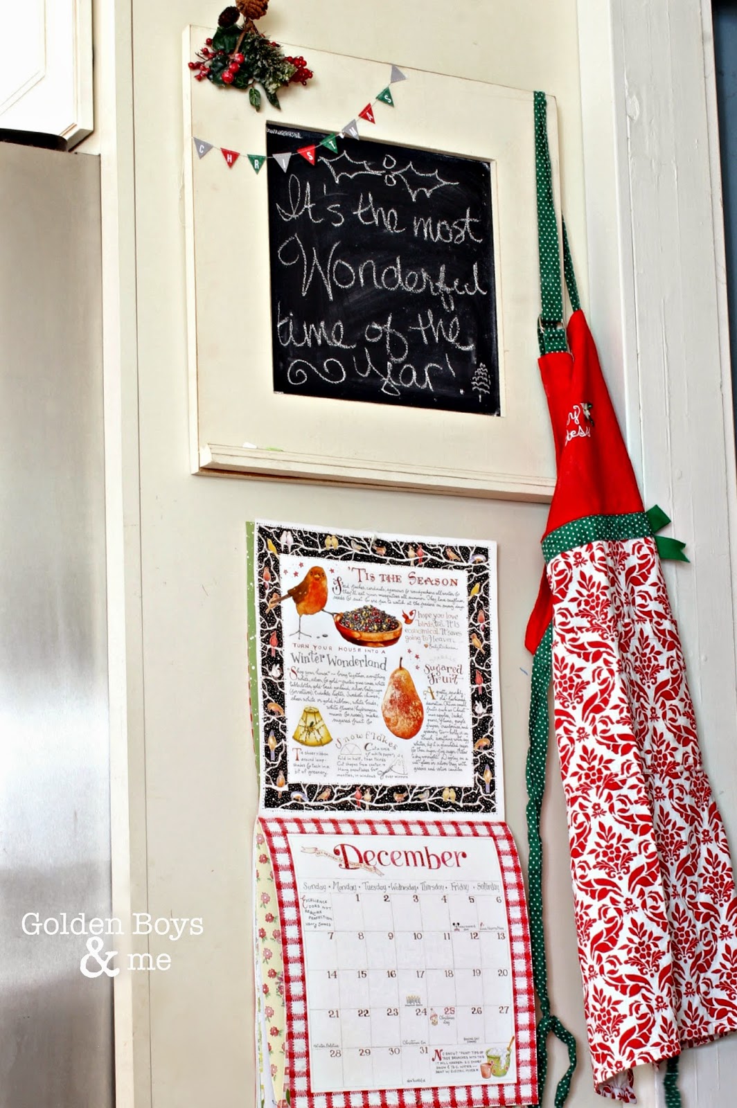 Susan Branch calendar, apron and chalkboard in Christmas kitchen-www.goldenboysandme.c