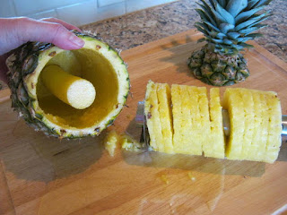 Remove the handle to easily slide the pineapple slices off the cutter.