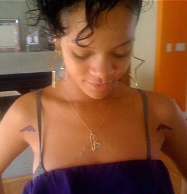 rihanna tattoos gun. rihanna tattoo.