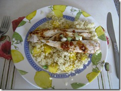 Sticky chicken on mango couscous.