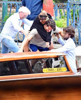 Emma Watson enjoys piggyback ride on Ryan Kohn while out in Venice Lido,  Italy