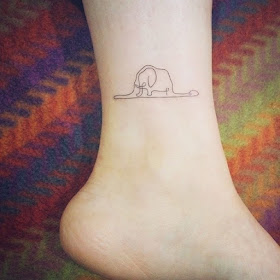 tatuaje sombrero o elefante