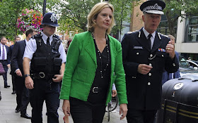 Amber Rudd and policemen