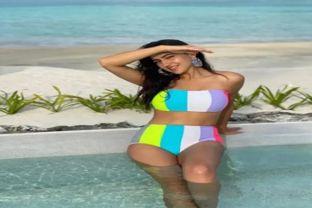 sara ali khan looking hot and sexy in multicolor bikini on beach