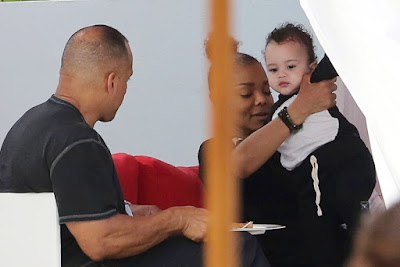 Janet Jackson pictured feeding her baby son Eissa in Miami Beach, Florida