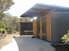 The bathroom facilties consist of two toilets, one inside a wheelchair accessible size room. There are two wash basins, one outside as seen here, and the other inside the larger toilet room