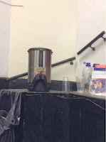 Water urn and plastic cups for donors 