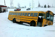 This Lakeland school bus ended up in the swale in front of Post Falls High . (lakeland bus )