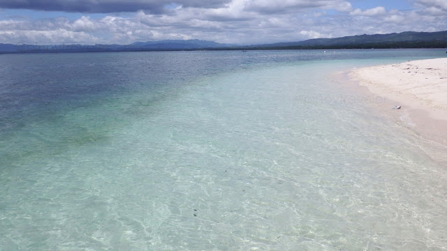 white sandy corner beach at the northeastern end of Canigao Island, Matalom Leyte