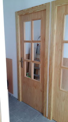 Puertas fabricadas a medida en madera y cristal de espejo