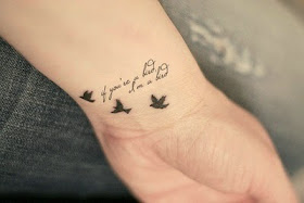 Beautiful Birds tattoos on hand