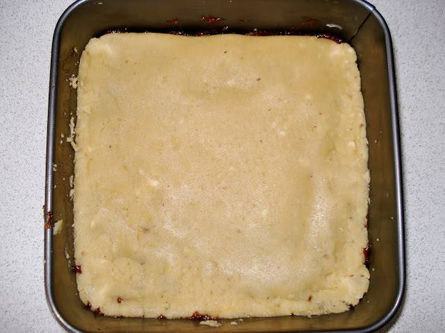 Apricot Slice in the tin ready to bake in the oven