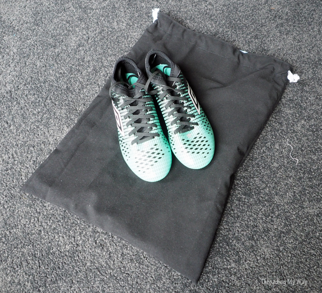 Make a bag to carry soccer boots and shin pads. Drawstring bag tutorial by Threading My Way.