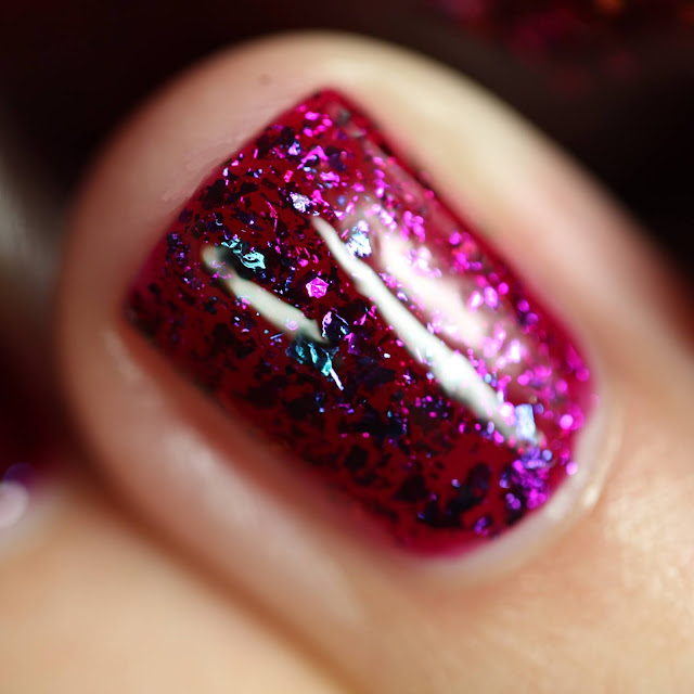 raspberry pink nail polish with multi chrome flakes