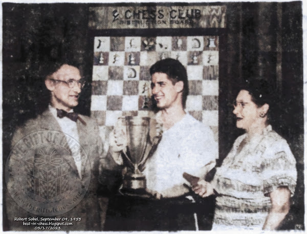 Chess Champions Receive Trophies: Robert D. Sobel, a 19-year laboratory technician from Philadelphia, center, receives the state chess traveling trophy from William B. Yeagley, president of the Y Chess Club, after the youth won senior division title of the Fifteenth Annual State Chess Tournament held over the week-end in the Hotel Yorktowne ballroom.