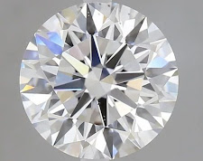 Close-up shot of a shiny round diamond on a gray background.