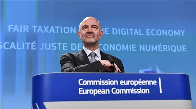 Image Attribute: European Commissioner for Economic and Financial Affairs, Taxation, and Customs Pierre Moscovici addresses a press conference at the European Union in Brussels on March 21, 2018. (AFP)