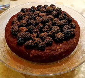 Vegan chocolate macadamia cake with blackberries