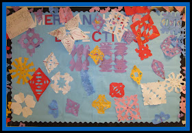 photo of: Snowflakes Galore Bulletin Board via RainbowsWithinReach Christmas Bulletin Board RoundUP