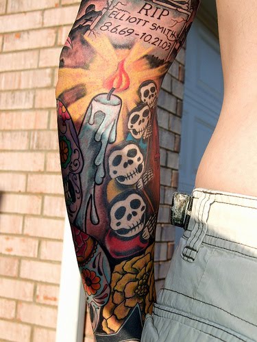 skull tattoos arm. Candle skull tribute arm