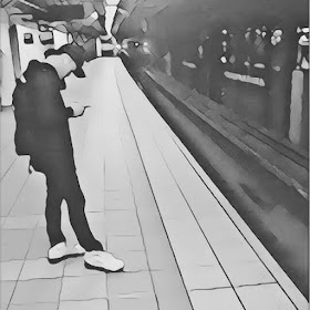 A straphanger waits for a train at the 36th Street subway station in Brooklyn.