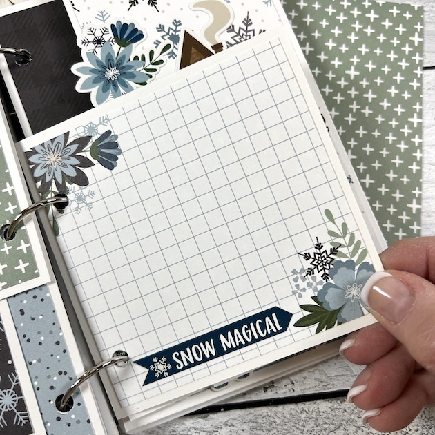 Winter Scrapbook Album Page with lots of pretty blue and green flowers
