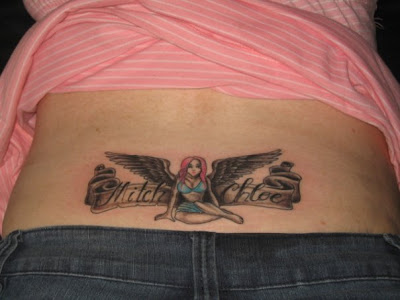 lower back angle wings tattoo