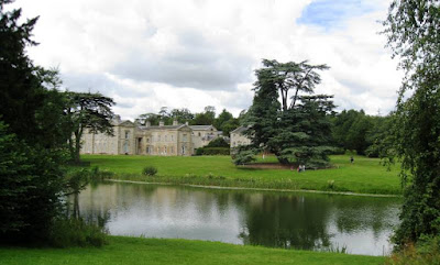 View of mansion across lake