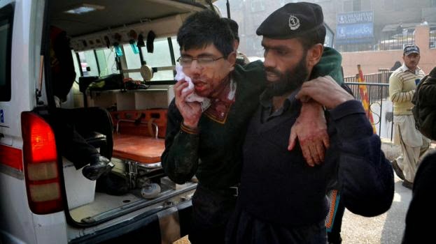 Taliban militants dead after killing at least 130, mostly children, in Pakistan school