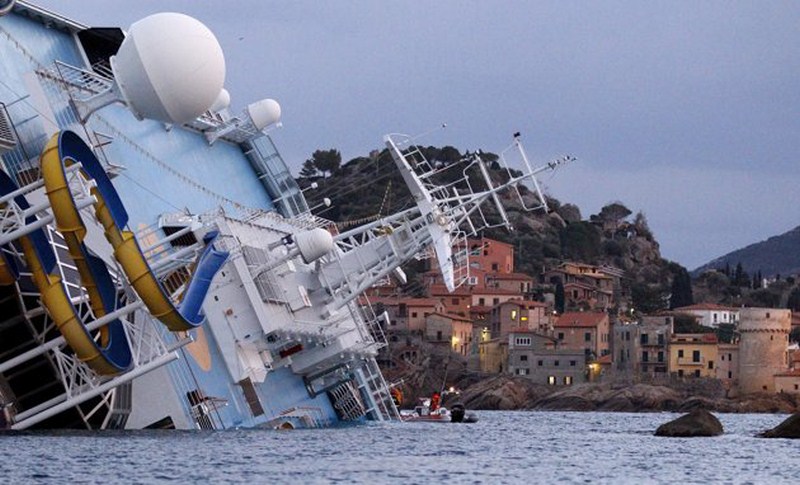 Italian Cruise Ship Costa Concordia Topples at Shore