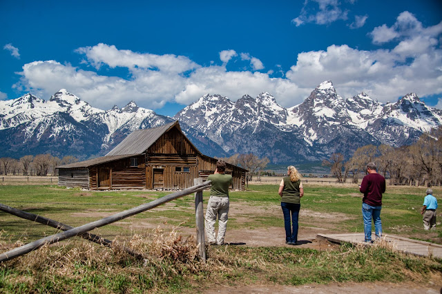 Photographers taking pictures of the Moulton Barn Mormon Row Grand Tetons National Park Jackson Hole Wyoming