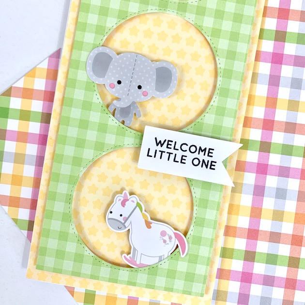 Baby handmade greeting card with elephant and rocking horse