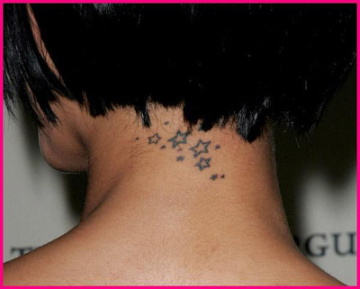 Jordan flashes her new neck tattoo. RnB sensation Rihanna has added a new