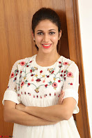 Lavanya Tripathi in Summer Style Spicy Short White Dress at her Interview  Exclusive 227.JPG