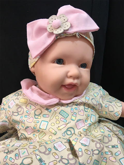 boneca bebê dodói com vestido novo