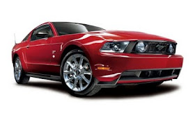 Front 3/4 view of red 2011 Ford Mustang GT