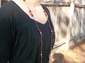 simple holiday style sparkly jewelry red jewelry grey dress black maxi dress black sweater black bow flats dressember chat money