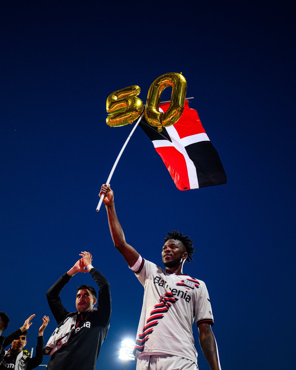 Bayer Leverkusen Burkinabé centre-back, Edmond Tapsoba, raise 50 balloon in celebration of the Black and Reds "50 unbeaten" season