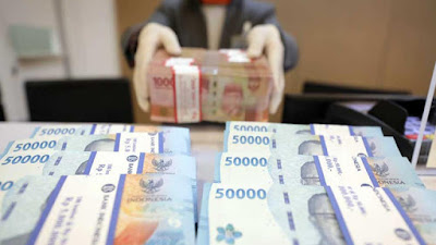 Rupiah Ditutup Menguat Lawan Dolar AS usai BI Tahan Suku Bunga