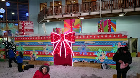 Santa's grotto decorated as a giant present at chill Factore, Manchester