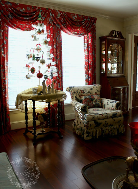 White feather tree decorated with Waterford ornaments and a nativity scene