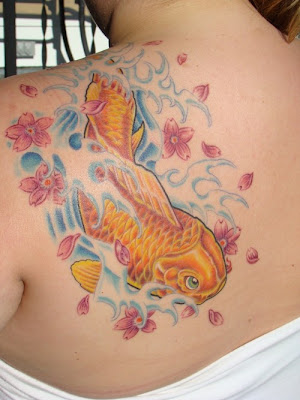 goldfish tattoo meaning. hot japanese goldfish tattoo.